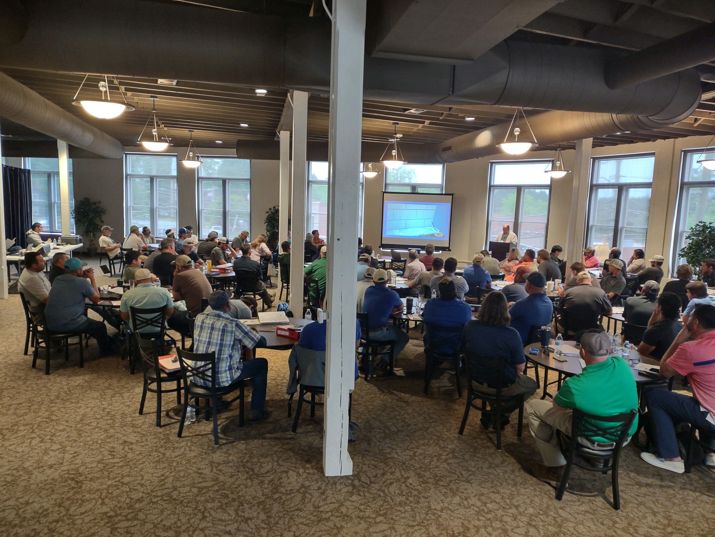 Masonry professionals attending a certification class